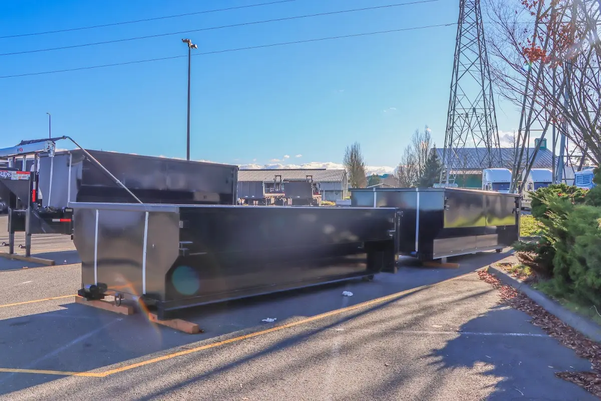 Roll-off dumpster ready for waste disposal at job site for Demolition Dumpster Rental in Wheatfield